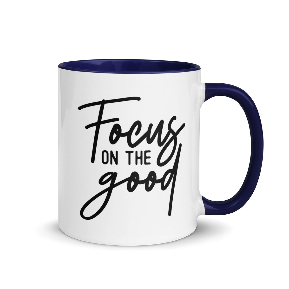 Brewtiful Sips white ceramic mug with navy blue interior and handle featuring Focus On The Good black script text