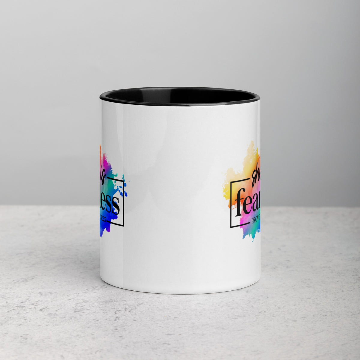 Brewtiful Sips She Is Fearless two-tone ceramic mug with a colorful watercolor design and Proverbs 31:25 verse.