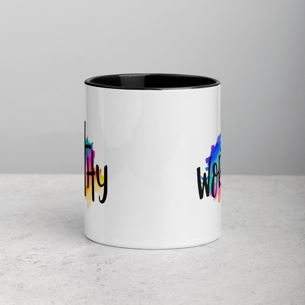 Brewtiful Sips 11oz ceramic mug with a white exterior, black interior, and colorful Worthy watercolor text design.